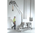 Diced and broken peanuts are emptied from bulk bags into the 80 liter (2.8 cu. ft.) hopper from which the 3.25 m (10.66 ft) long flexible screw conveyor transports the stock to a peanut mill. The portable frame permits a quick move to the cleaning area during product changeovers.