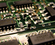 Fixing tombstoned components (centre) caused by poor PCB design costs ten times more than optimising the board for automated manufacture.