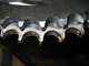 As roller chain elongates it will be found that the individual rollers will start to contact the flanks of the sprocket teeth rather than fitting perfectly into the seating radius.